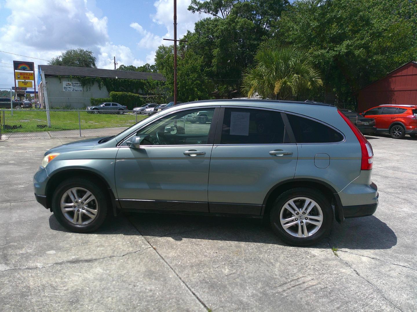 2010 GREEN HONDA CR-V EX-L (5J6RE3H79AL) , located at 10405 Abercorn Street, Savannah, GA, 31419, (912) 921-8965, 31.988262, -81.131760 - Photo#1